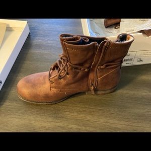 Kickball brown zip-up boots with laces.  Ankle height size women’s 5